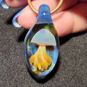 Glass jellyfish pendant handmade blown glass jellyfish necklace made with borosilicate.  A great ocean themed gift.  Blown glass jewelry