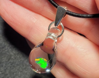 Gilson opal nugget encased in borosilicate pendant in sterling silver.  I call this teardrop dangle necklace design “Mermaid’s tears”.
