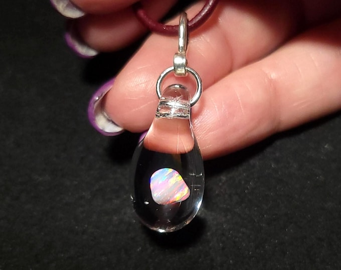 White Gilson opal nugget encased in borosilicate pendant in sterling silver.  I call this teardrop dangle necklace design “Mermaid’s tears”.