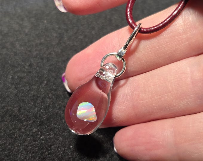 White Gilson opal nugget encased in borosilicate pendant in sterling silver.  I call this teardrop dangle necklace design “Mermaid’s tears”.