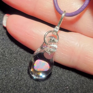 White Gilson opal nugget encased in borosilicate pendant in sterling silver.  I call this teardrop dangle necklace design “Mermaid’s tears”.