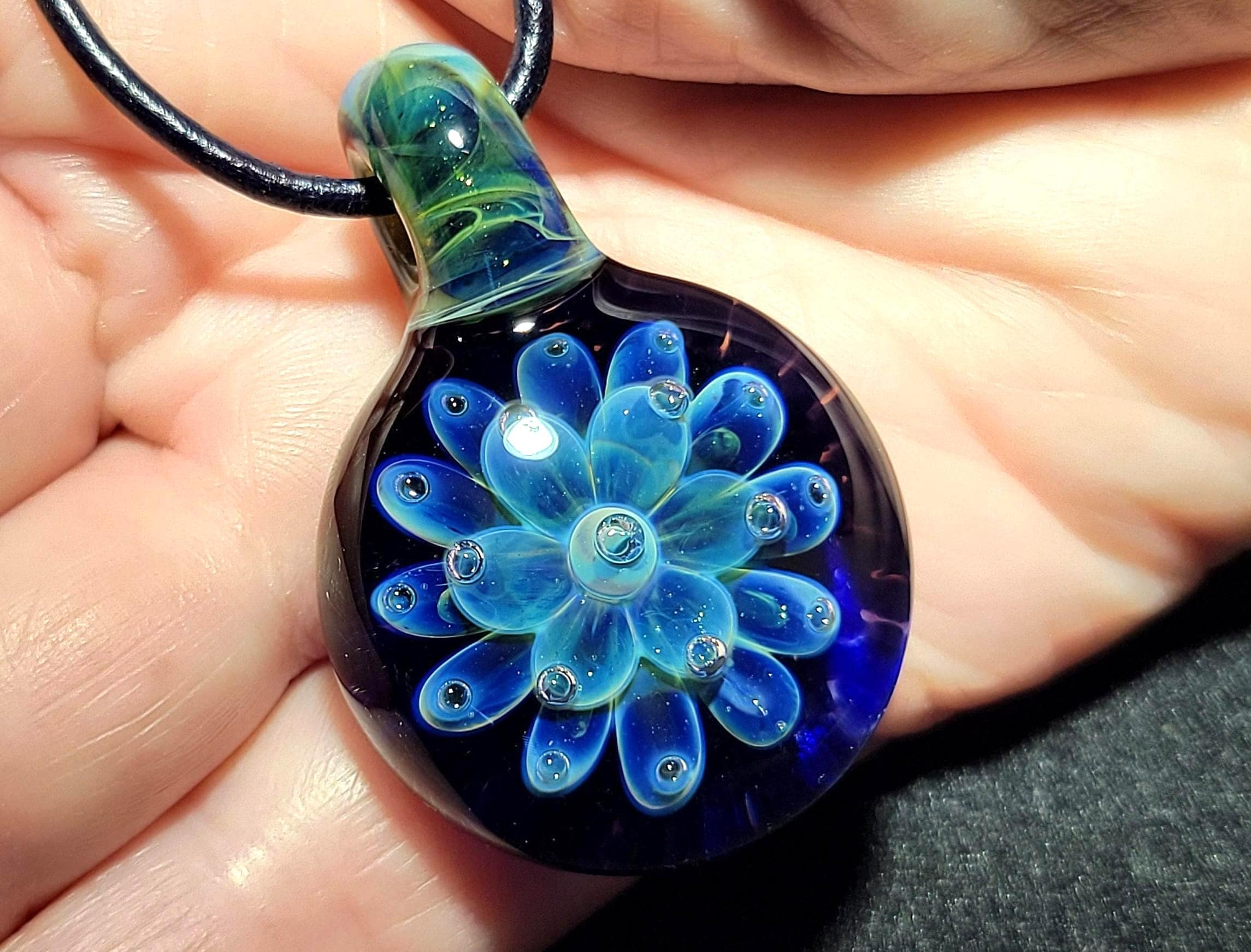 Hand blown glass flower choker, borosilicate glass implosion pendant with sterling silver and round Greek leather.