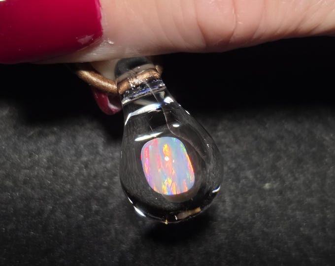 Large Gilson opal nugget encased in borosilicate pendant.  I call this hand blown glass teardrop dangle necklace design “Mermaid’s tears”.