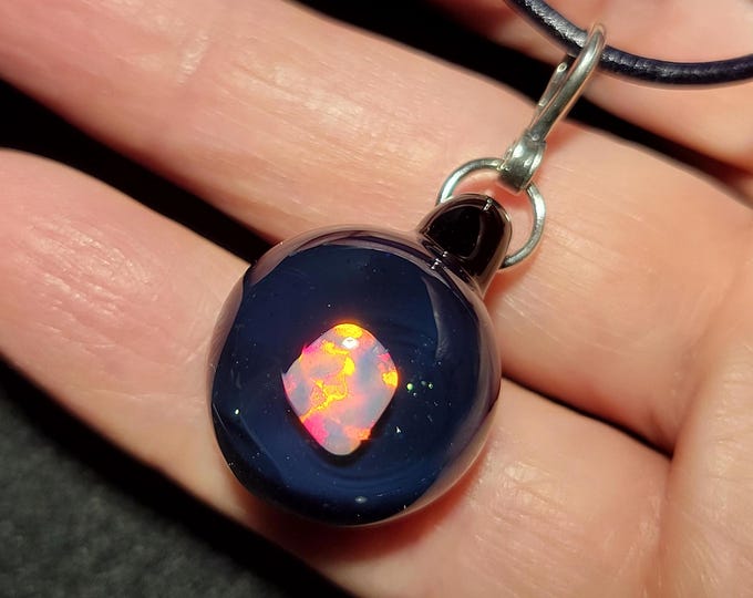 Tiny white Gilson opal choker pendant in sterling silver.  I call this dangle opal necklace encased in glass design “Mermaid’s tears”.