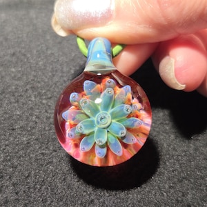 Hand Blown Glass Implosion Pendant, Handmade Borosilicate Heady Glass Necklace, With Sparkly Blue/Green Flower.
