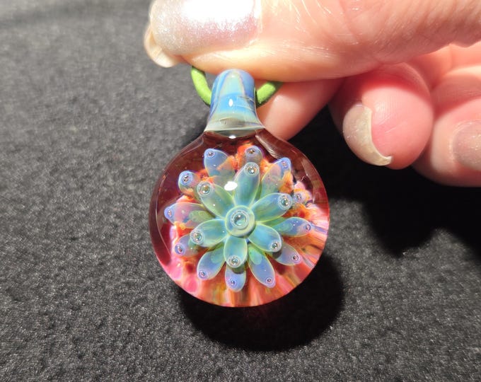 Hand Blown Glass Implosion Pendant, Handmade Borosilicate Heady Glass Necklace, With Sparkly Blue/Green Flower.
