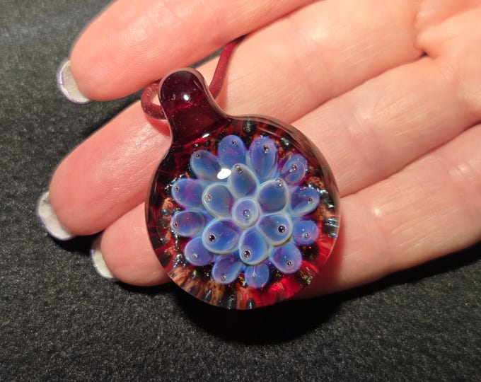 Borosilicate artisan glass choker, hand blown glass pendant with a ruby red, pink and purple implosion design.  Blown glass jewelry.