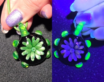Heady Hand blown glass Jewelry.  Borosilicate pendant with UV reactive glow glass.  Color changing glass Implosion necklace for blacklights