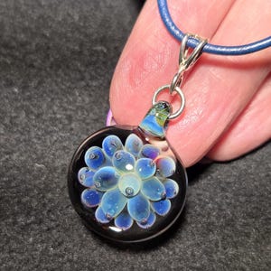 Blue boro Implosion pendant, hand blown borosilicate glass, clear backed sparkly color changing design with sterling silver bail!