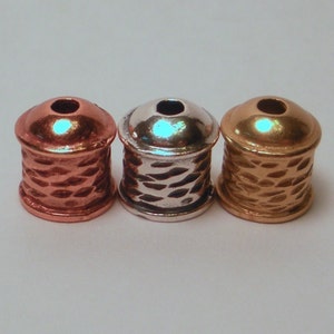 12 Viking Knit End cap textured assortment in 3 metals, sterling silver, brass, & copper.  They also work for kumihimo.