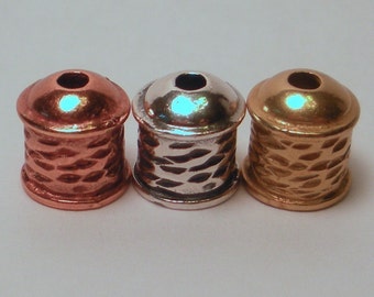 12 Viking Knit End cap textured assortment in 3 metals, sterling silver, brass, & copper.  They also work for kumihimo.