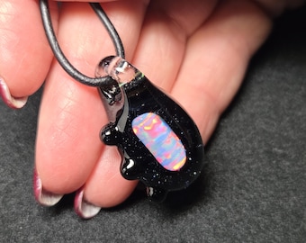 Large Gilson opal necklace encased in borosilicate.  Sparkly celestial black background with stars and a ribbon chaff pattern cut opal