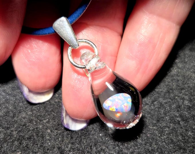 Tiny white Gilson opal choker pendant in sterling silver.  I call this dangle opal encased in glass necklace design “Mermaid’s tears”.