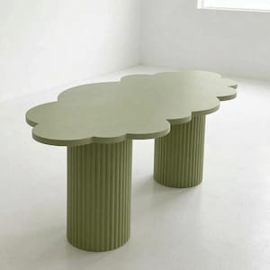May include: A sage green table with a cloud-shaped top and two cylindrical, ribbed legs. The table is a unique piece of furniture, likely for a living room or bedroom. The table's dimensions are not visible.
