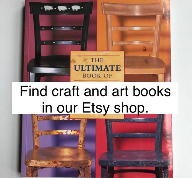 May include: A book titled "The Ultimate Book Of" with four chairs in the background. The chairs are painted in different colors and have a distressed look. The text "Find craft and art books in our Etsy shop." is at the bottom of the image.