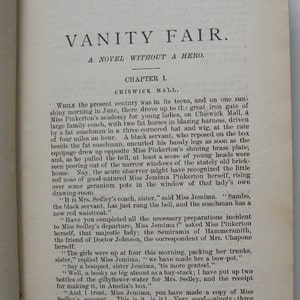 May include: A page from a vintage book titled "Vanity Fair: A Novel Without a Hero." The text describes a carriage arriving at a school for young ladies. The text includes the names Miss Pinkerton and Miss Jemima.