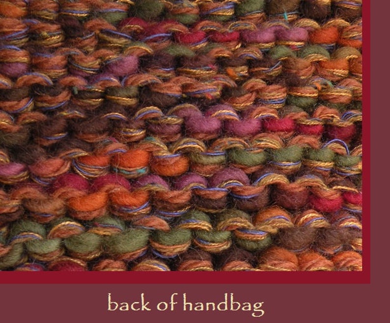 May include: Close-up of the back of a handbag made of woven fabric with a variety of colors, including brown, orange, red, green, and blue.