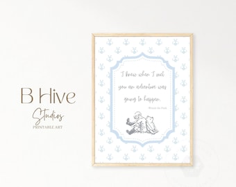 May include: A light blue printable art print with a Winnie the Pooh quote: "I knew when I met you an adventure was going to happen." The quote is surrounded by a light blue border with a bee pattern.