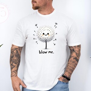 Raunchy gag gift shirt for men featuring a cute dandelion with inappropriate joke design.