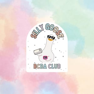 May include: A white sticker with a cartoon goose wearing sunglasses and holding a device. The text "SILLY GOOSE" arches above the goose, and "BCBA CLUB" is written below. The background is a watercolour wash of pastel colours.