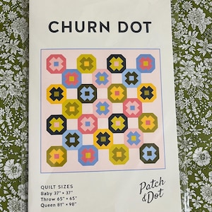 May include: A package featuring a quilt pattern titled "CHURN DOT." The design showcases a repeating pattern of colorful octagons on a pink background. Quilt sizes are listed as Baby (37" x 37"), Throw (65" x 65"), and Queen (81" x 98"). The brand name "Patch & Dot" is also visible.