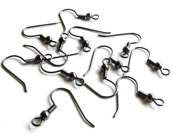 May include: A group of ten black earring hooks with a spring-loaded closure. The hooks are made of metal and have a small ball at the end.