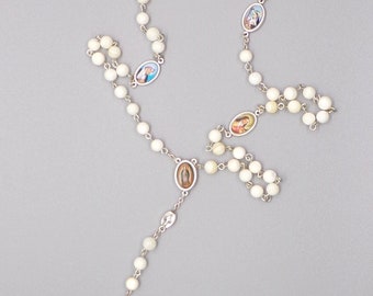Mother of Pearl rosary with female Sts.