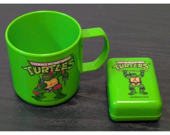 Vintage 1990 Mirage Studios TMNT Becher Tasse Reisekoffer Raphael Donatello Grün