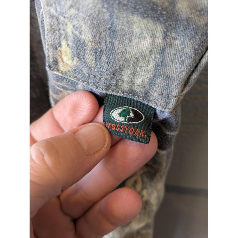 Pantaloni vintage Mossy Oak da uomo, taglia 42x32, in tela mimetica, vestibilità comoda, ideali per la caccia, stile anni '90. immagine 6