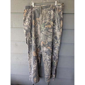 Pantaloni vintage Mossy Oak da uomo, taglia 42x32, in tela mimetica, vestibilità comoda, ideali per la caccia, stile anni '90. immagine 1