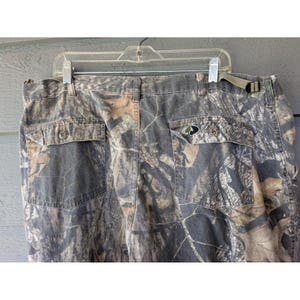 Pantaloni vintage Mossy Oak da uomo, taglia 42x32, in tela mimetica, vestibilità comoda, ideali per la caccia, stile anni '90. immagine 7