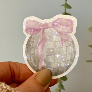 Sticker holographique boule disco avec noeud -  Autocollant mignon pour Ordinateur Portable, Cahier, et Plus