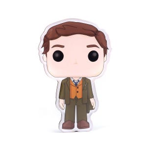 May include: A Funko Pop! vinyl figure of a man in a brown suit, orange vest, and tie. The figure has large black eyes and brown hair. The figure is a collectible item.