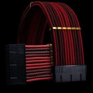 Puede incluir: Cable de ordenador trenzado rojo y negro con conectores dorados y carcasa de plástico negro. El cable está envuelto en una funda trenzada roja y negra.