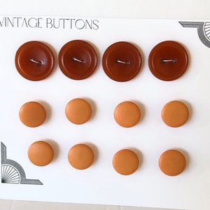 Vintage set of 12 buttons, Four 7/8&quot; light red two hole buttons, Eight 5/8&quot; mustard yellow shank buttons, Lot of vintage sewing buttons