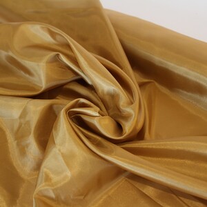 Gold Woven Fabric, Shiny lightweight lining, Shimmery golden fabric, Apparel sewing fabric, Lingerie intimates lining, BTY Fabric