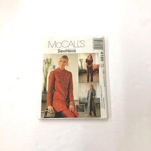 May include: A McCall's SewNews pattern envelope featuring a woman in a red suit. The envelope includes images of the finished garments, with the pattern number 4195 and size DD (12-14-16-18) printed on the side.
