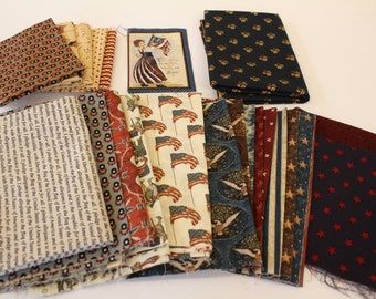 Lot of 21 Assorted red white and blue Historic style patriotic fabrics in various sizes, vintage style patriotic fabrics,