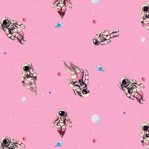 May include: Pink background with a repeating pattern of astronauts in space suits, planets, and stars. The astronauts are in various poses, with pink and white space suits. The planets are white and the stars are small white dots.