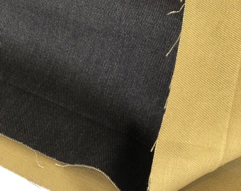 Tejido de sarga negro con aspecto vaquero, reverso estampado en dorado, 100 % algodón japonés, por metro.
