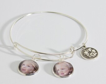 Silver plated bangle with family themed charm and photo charms