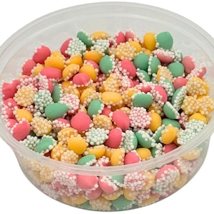 May include: A clear plastic container filled with pastel-colored candy. The candy is round and has a white sugar coating. The colors of the candy are pink, green, and yellow.