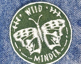 Patch papillon brodé en feutre de laine | Logo Wild Minder, thermocollant