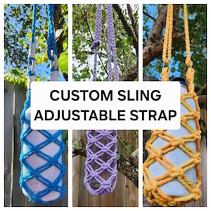 May include: Three different color custom slings with adjustable straps for water bottles. The slings are made of rope and have a diamond pattern. The slings are hanging from tree branches.