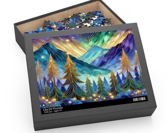Könnte beinhalten: Ein 500-teiliges Puzzle mit einer farbenfrohen Berglandschaft und einem sternenklaren Nachthimmel. Die Puzzlebox ist schwarz mit goldener Umrandung und dem Text "16x20 Puzzle 500 pcs Ages 9+".