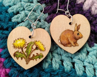 Mismatched heart earrings - rabbit and dandelion - hand painted pyrography