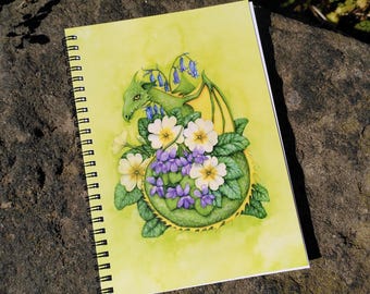 Floral Dragon Notebook - lined A5 spiralbound journal with spring flowers: primroses, violets and bluebells