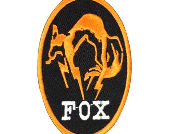 Parche bordado con el logotipo de Fox Kajima en la ropa