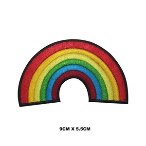 May include: Embroidered rainbow patch with red, orange, yellow, green, blue, and indigo stripes. The patch is outlined in black and measures 9cm x 5.5cm.