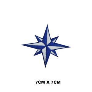May include: Blue and white embroidered compass star patch, 7cm x 7cm.